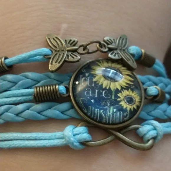 NWT butterfly, sunflower, infinity symbol braided leather bracelet - Picture 2 of 4